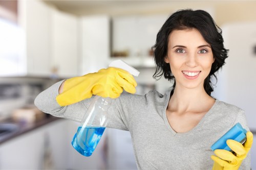 Technician using protective measures while handling cleaning products